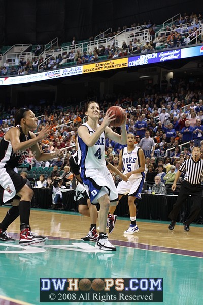 Sequence: Abby gets the layup and is fouled; chest bump and ensuing huddle