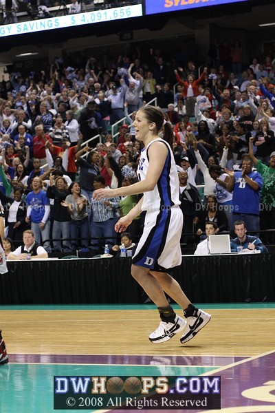 Sequence: Abby gets the layup and is fouled; chest bump and ensuing huddle