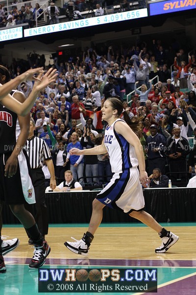 Sequence: Abby gets the layup and is fouled; chest bump and ensuing huddle