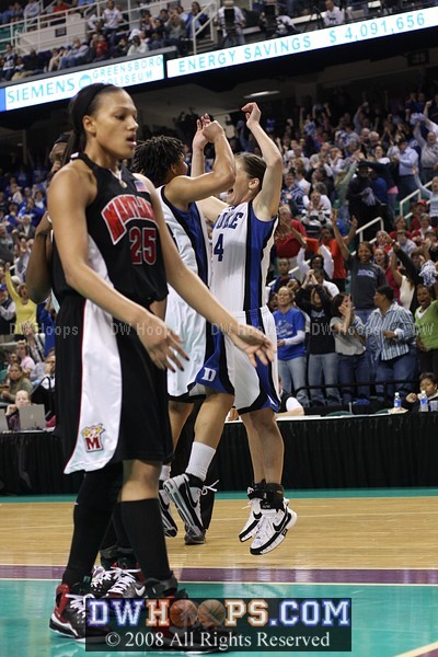 Sequence: Abby gets the layup and is fouled; chest bump and ensuing huddle