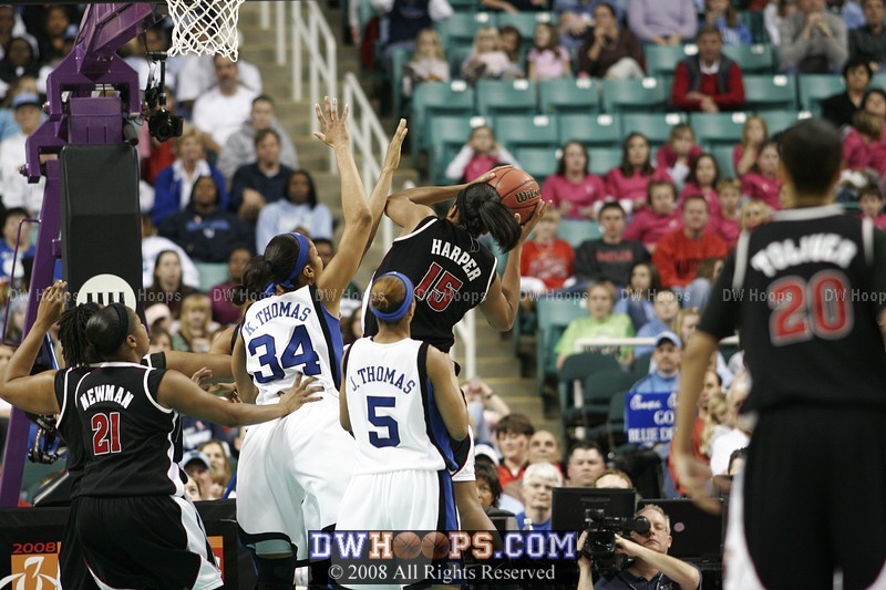 Laura Harper boards the Newman miss and is fouled by Krystal Thomas