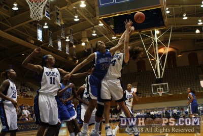Krystal Thomas and Abby Waner battle for the rebound after Chante's block -  - 
