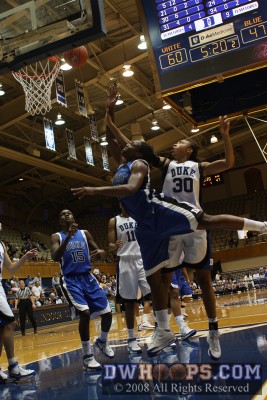 Karima Christmas drives past Carrem Gay to the basket -  - 