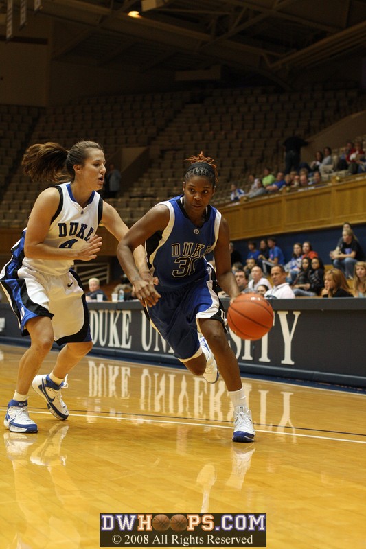 KJ tries to dribble around Abby