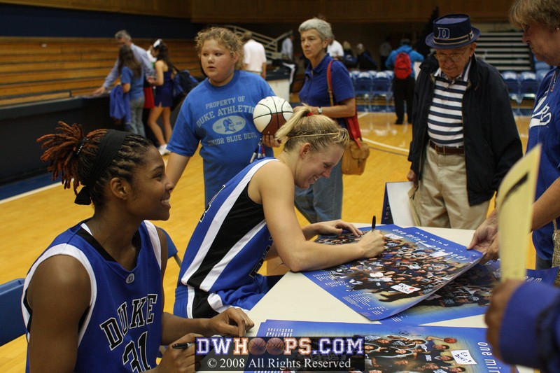 KJ and Scheer autograph posters postgame