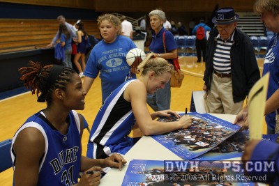 KJ and Scheer autograph posters postgame -  - 