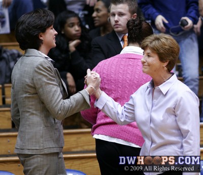 Miami Head Coach Katie Meier and Debbie Leonard, her former coach at Duke, meet before the game