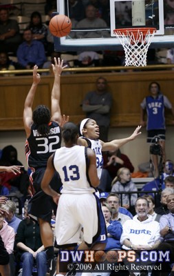 Woodson knocks down a jumper off a Duke turnover - 14 of Miami's 30 first half points came off Duke miscues.