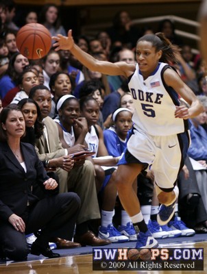 Jasmine Thomas can't get control of the ball heading up court after a rebound.