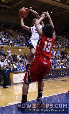 Jasmine Thomas charges into Demauria Liles