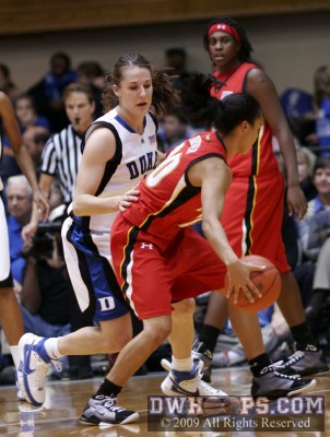 Abby Waner puts a hand on Toliver committing Duke's 6th team foul.
