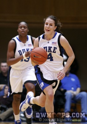 Abby Waner in the open floor (seeing Jasmine Thomas breaking to the basket off-frame)