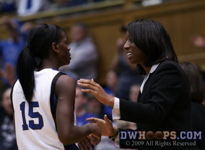Samantha Williams has some final coaching for Bridgette Mitchell before she returns to the floor -  - D15.DA;2, 12:25, 48-41