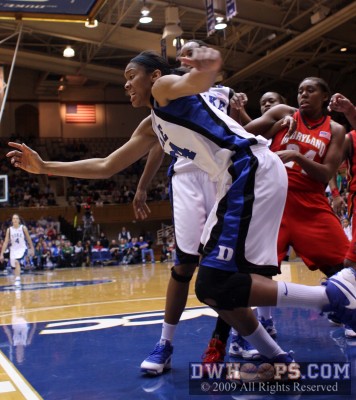 Krystal Thomas lunges for a rebound under the Duke basket -  - 