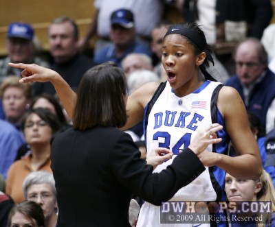 Coach McCallie gives Krystal Thomas some defensive coaching -  - 