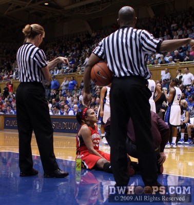 Marissa Coleman on the floor with a severe leg cramp.  She went out with 8:49 to play and Maryland down 3, then returned with 2:20 left and Maryland down 2. -  - 