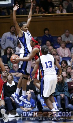 Wiley-Gatewood tries to get around Chante Black for a tying layup - she missed