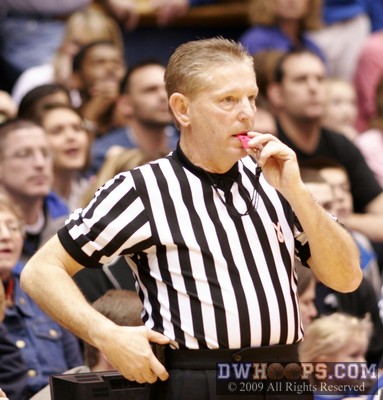 Referee Joe Cunningham gets ready to blow the pink whistle - they were brought out before the WBCA Pink Zone week because of the passing of Kay Yow
