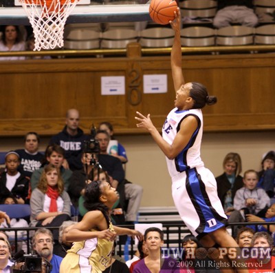 Chante Black soars above everybody in making this layup