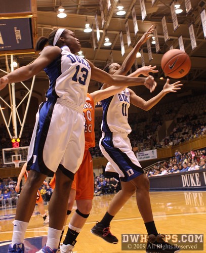 Christmas and Black vie for a rebound, ending up with the ball out to the Hokies