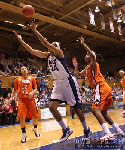 Krystal Thomas stretches for a wayward pass that became one of Duke's ten first half turnovers
