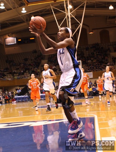 Chelsea Hopkins goes coast-to-coast after a steal to cap Duke's gamebreaking 16-0 first half run