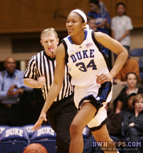 A peeved Krystal Thomas brings the ball upcourt because everybody else left already