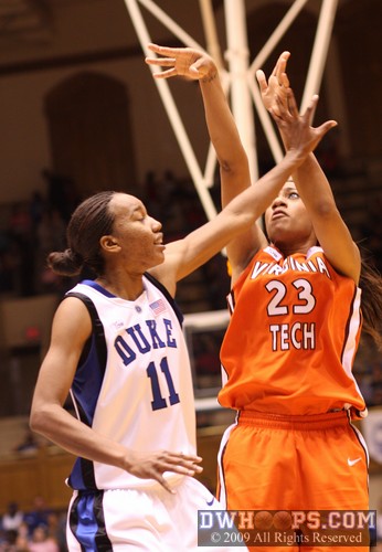 Brittany Gordon shoots over Chante Black