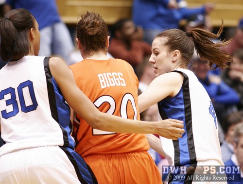 Gay, Waner, and the sideline gang up on Lindsay Biggs to force a Hokie turnover early in the second half