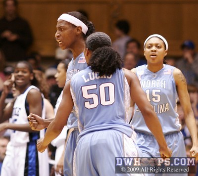 Rashanda McCants (center) reacts to drawing Chante Black's second foul