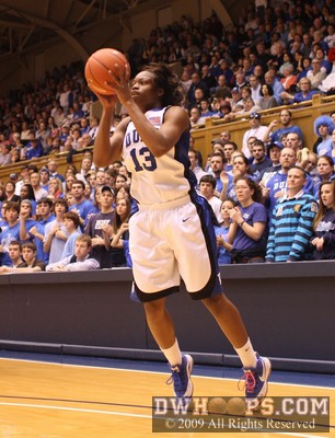 Karima Christmas catches before swishing a three pointer.  Duke and UNC would trade baskets for an eight point Blue Devil halftime advantage.