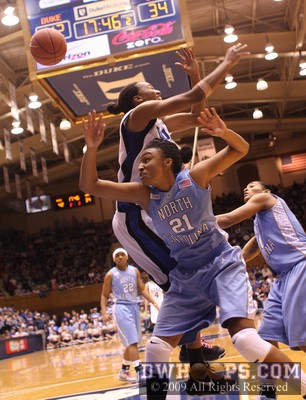 Chante Black picks up her third foul trying to board a Bridgette Mitchell miss.