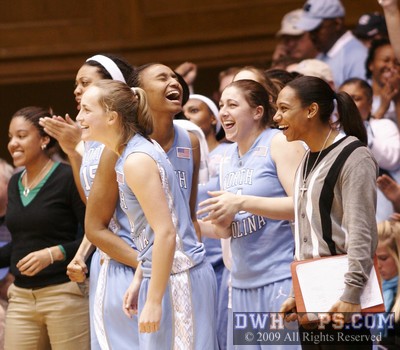 Carolina's bench cheers the Shegog bucket