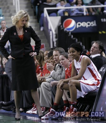 The Harpers and Strachan share a moment on the NCSU bench. -  - 