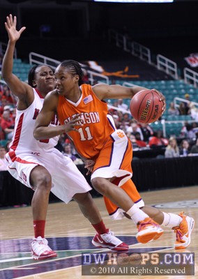 Lele Hardy drives into the lane -  - 