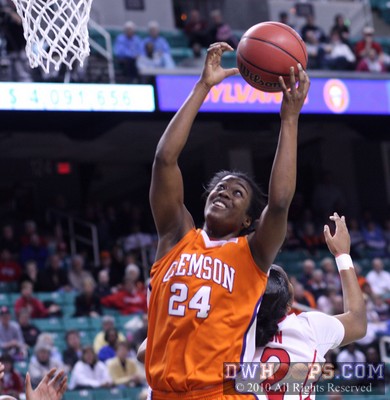 Jamine Tate grabs an offensive rebound -  - 