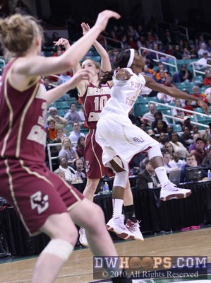 The airborne Christian Hunnicutt drifts into Kerri Shields follow through -  - 