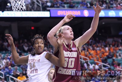 Chelsea Davis (34) and Carolyn Swords jockey for position under the BC basket -  - 