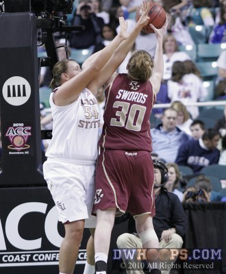 Carolyn Swords challenges Cierra Bravard in the paint -  - 